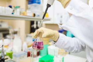 scientist with a beaker