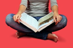 encyclopedia in lap
